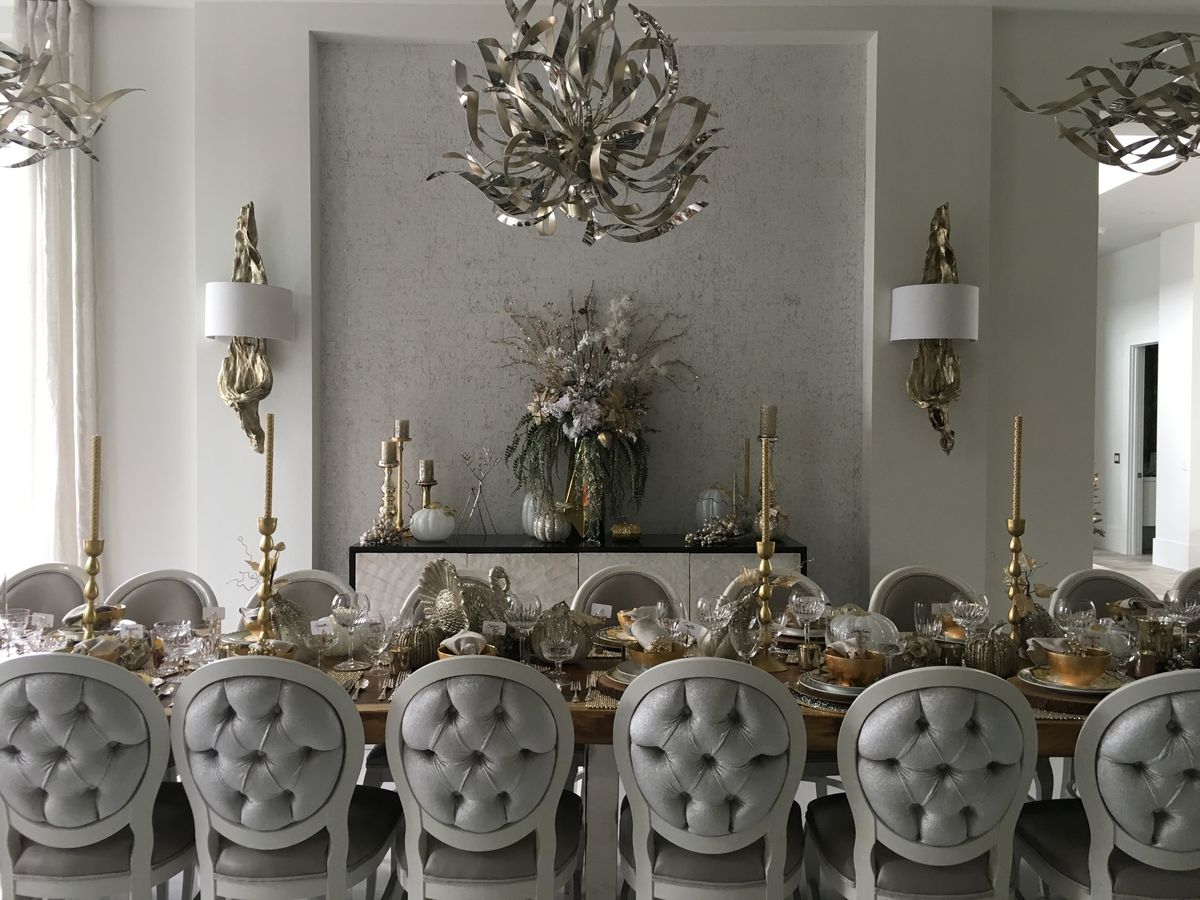 Formal dining with sculptural chandelier