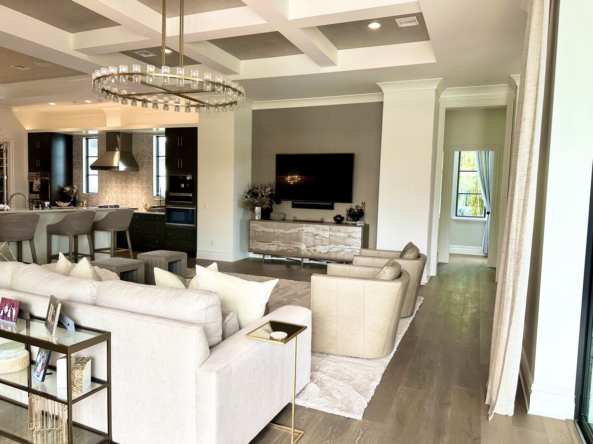 Open concept living with coffered ceiling